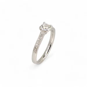 Platinum 0.30ct mill grain design diamond ring.