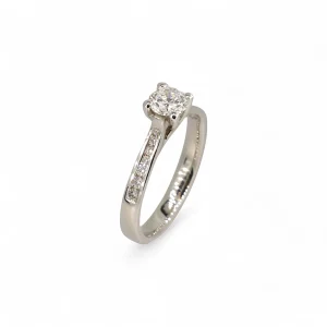Platinum graduated channel set diamond ring.