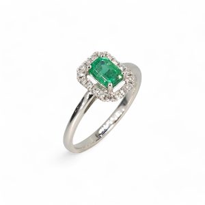 Platinum Emerald and diamond halo