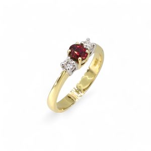 18ct yellow gold 0.34ct cut ruby and diamond three stone