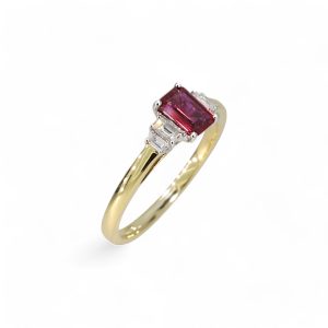18ct yellow gold emerald cut ruby three stone