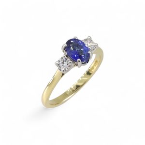 18ct yellow gold 0.70ct sapphire and diamond three stone