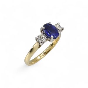 18ct yellow gold 1.52ct sapphire and diamond three stone