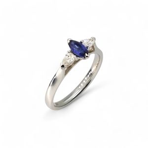 Platinum marquise sapphire and diamond three stone