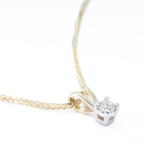 9ct yellow gold 0.16ct four claw set pendant