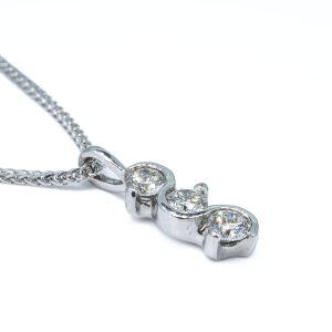 18ct white gold three stone pendant