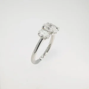 Platinum lab grown oval three stone ring