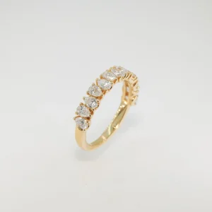 Yellow gold lab grown diamond pear shaped band